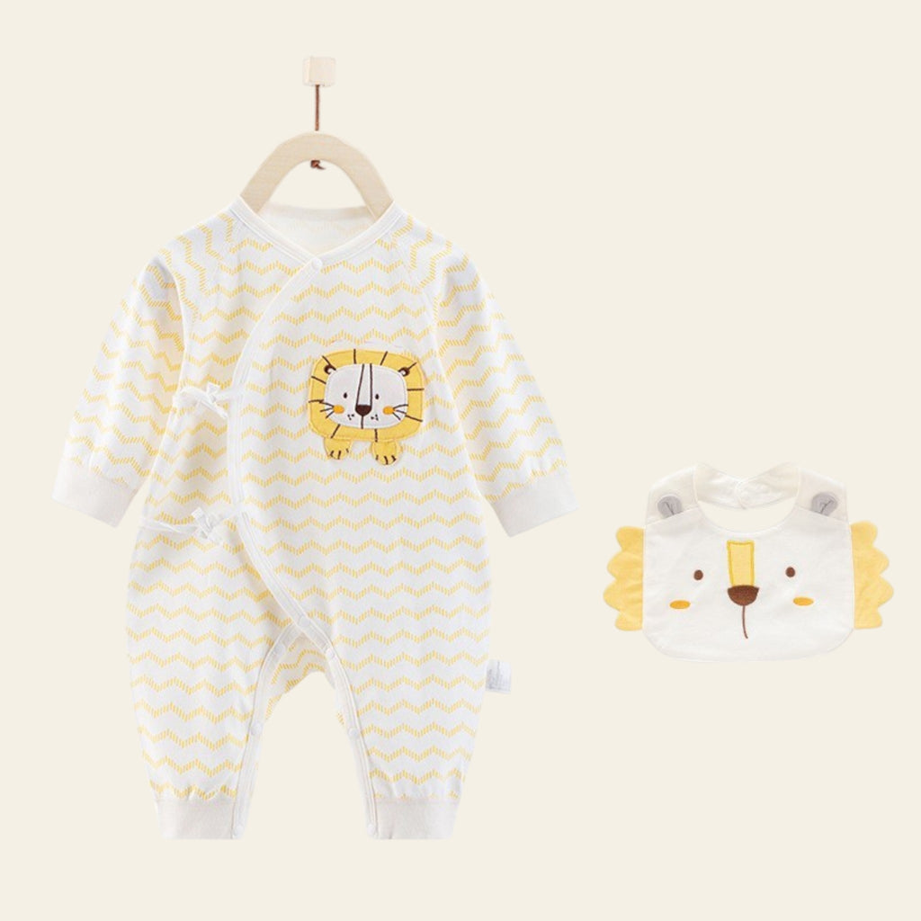 Baby onesie with lion design and matching bib on a white background