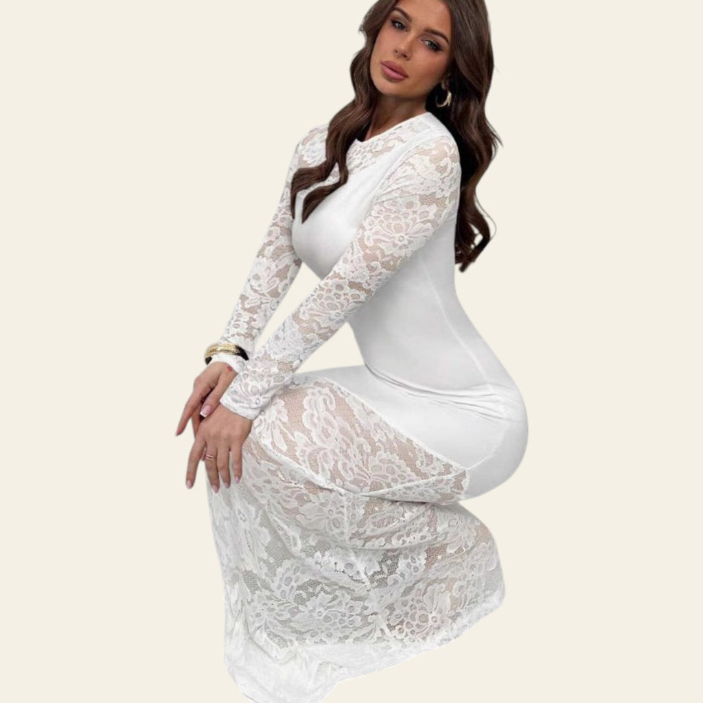Woman wearing a white lace long-sleeve bodycon maxi dress with sheer lace detailing, standing against a plain white background