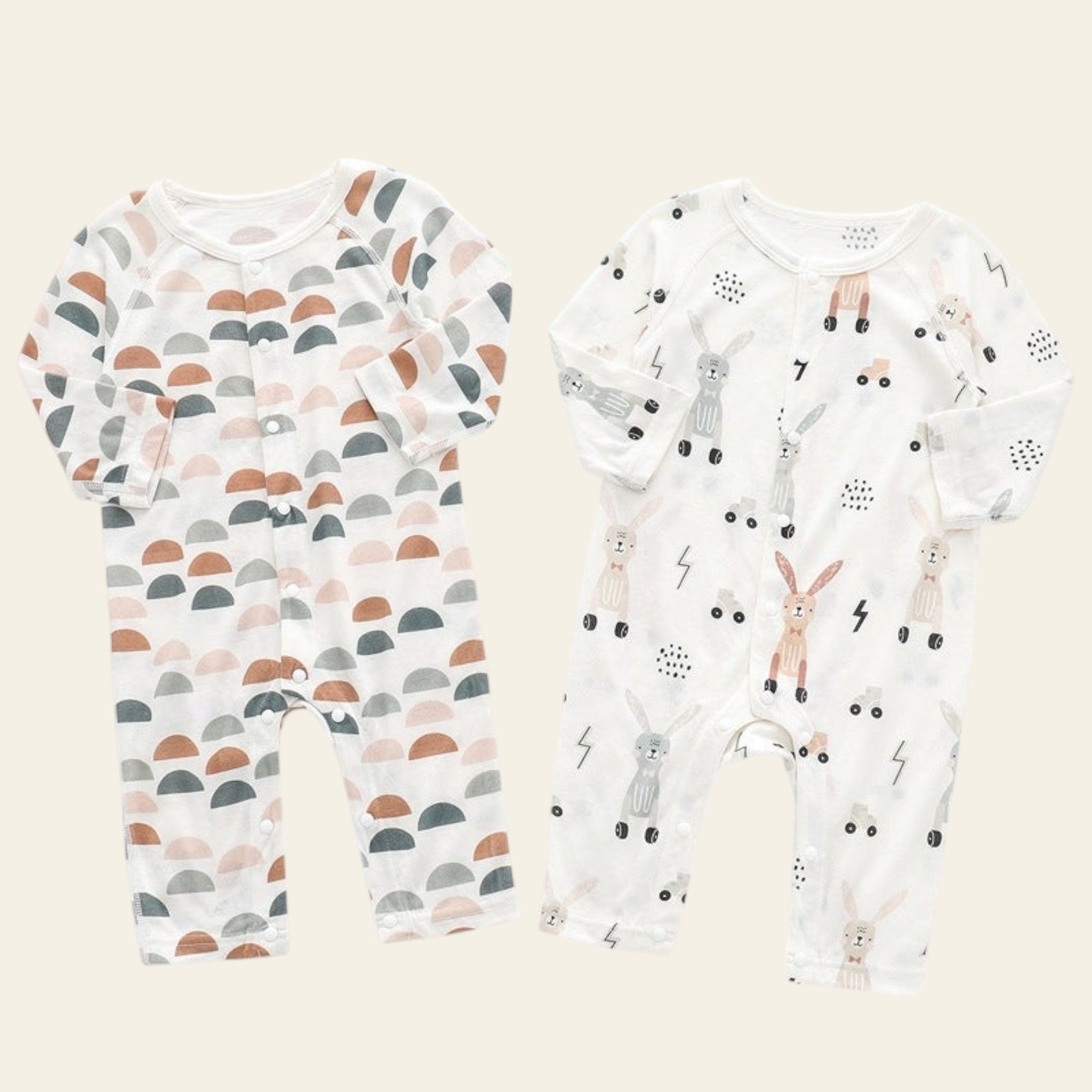 Two baby rompers with different patterns on a gradient background