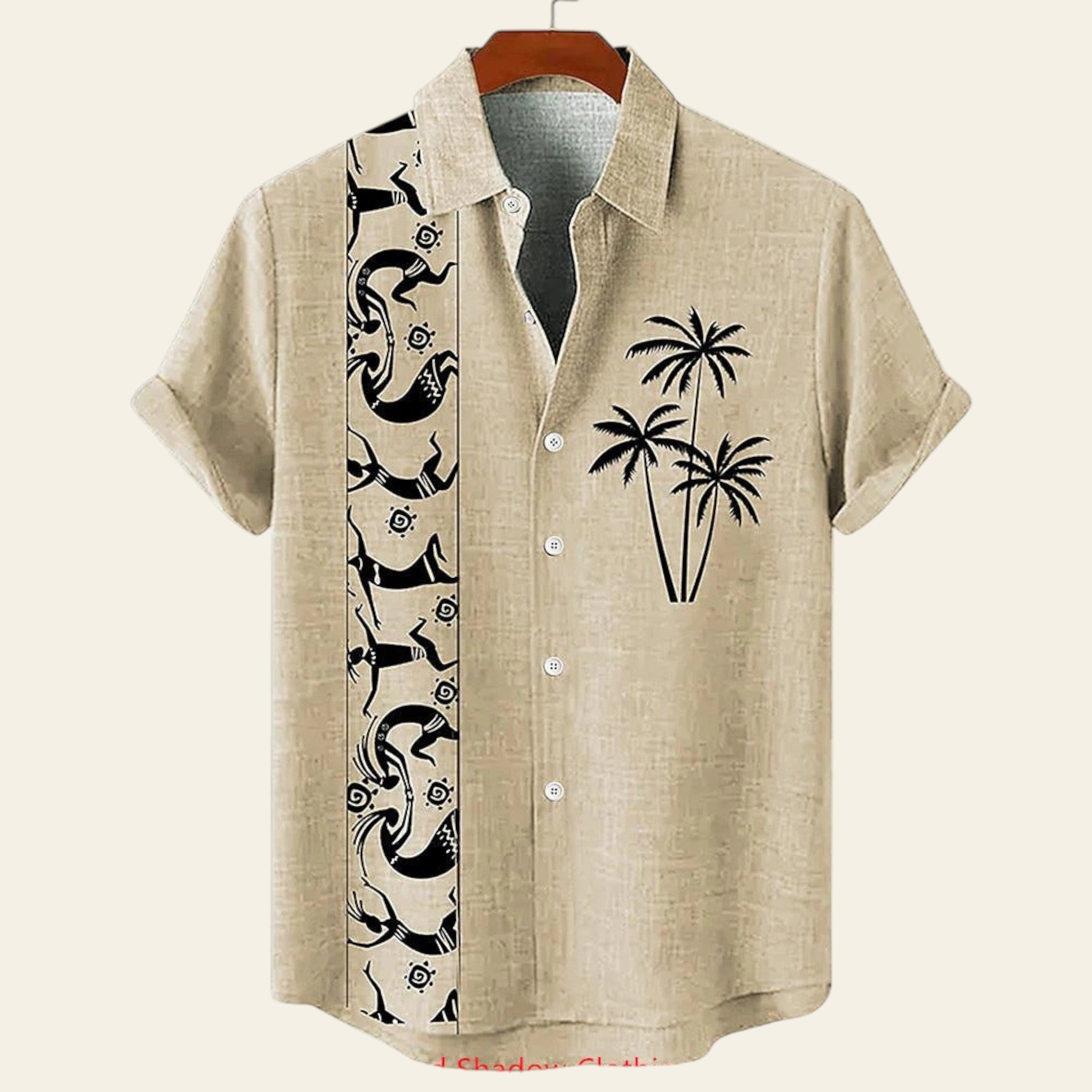 Beige shirt with black palm tree and abstract designs on a hanger against a white background.