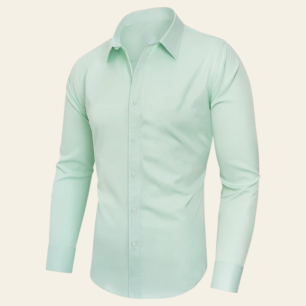 Man wearing a light green long sleeve men's shirt