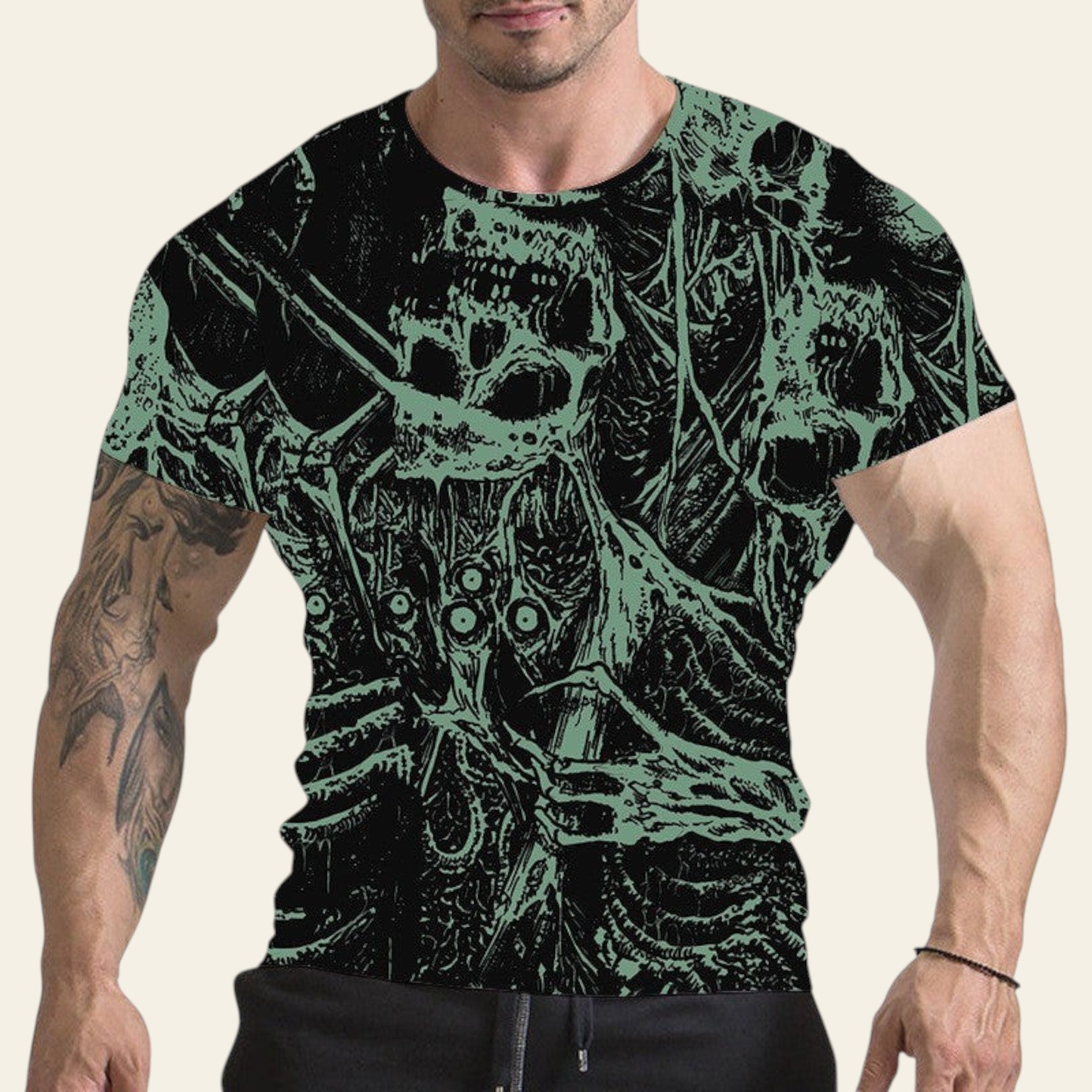 Man wearing a black t-shirt with green skeleton design on a white background