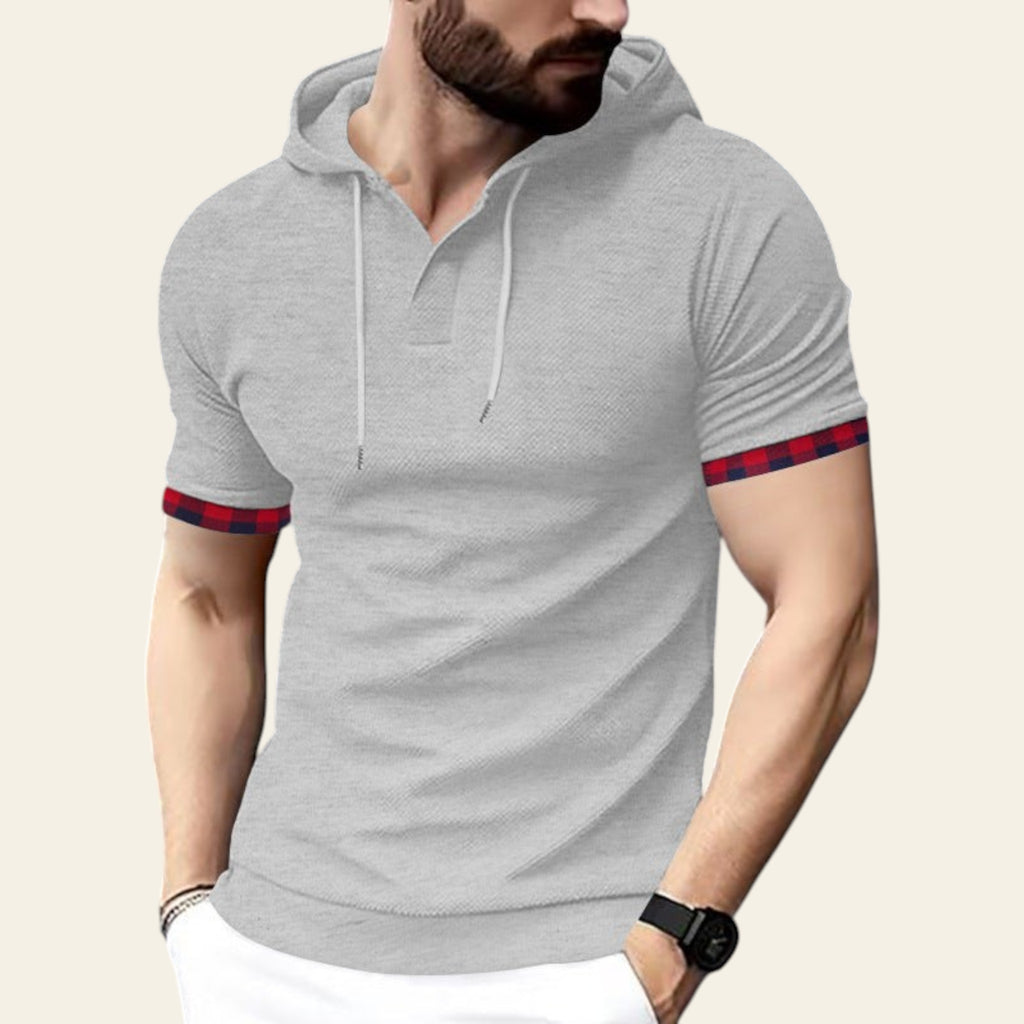 Man wearing a gray short sleeve hoodie t-shirt with modern streetwear style