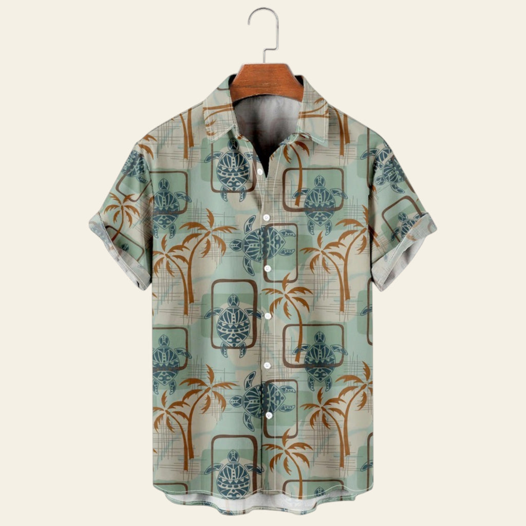 Light blue men's short sleeve shirt with palm tree and geometric tropical print, casual lapel button-up shirt on hanger