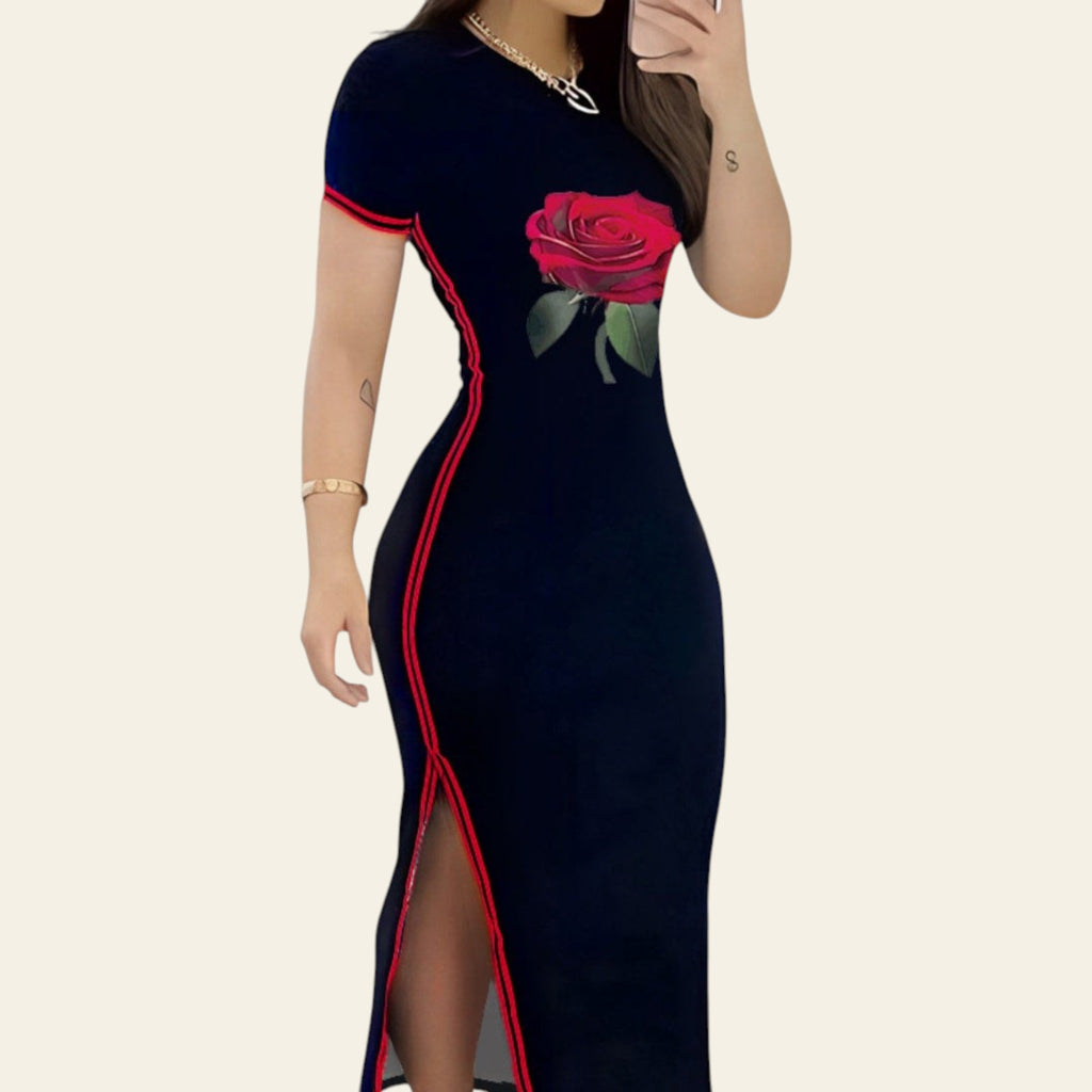 Black color-block maxi dress with red rose detail and side stripes on a woman
