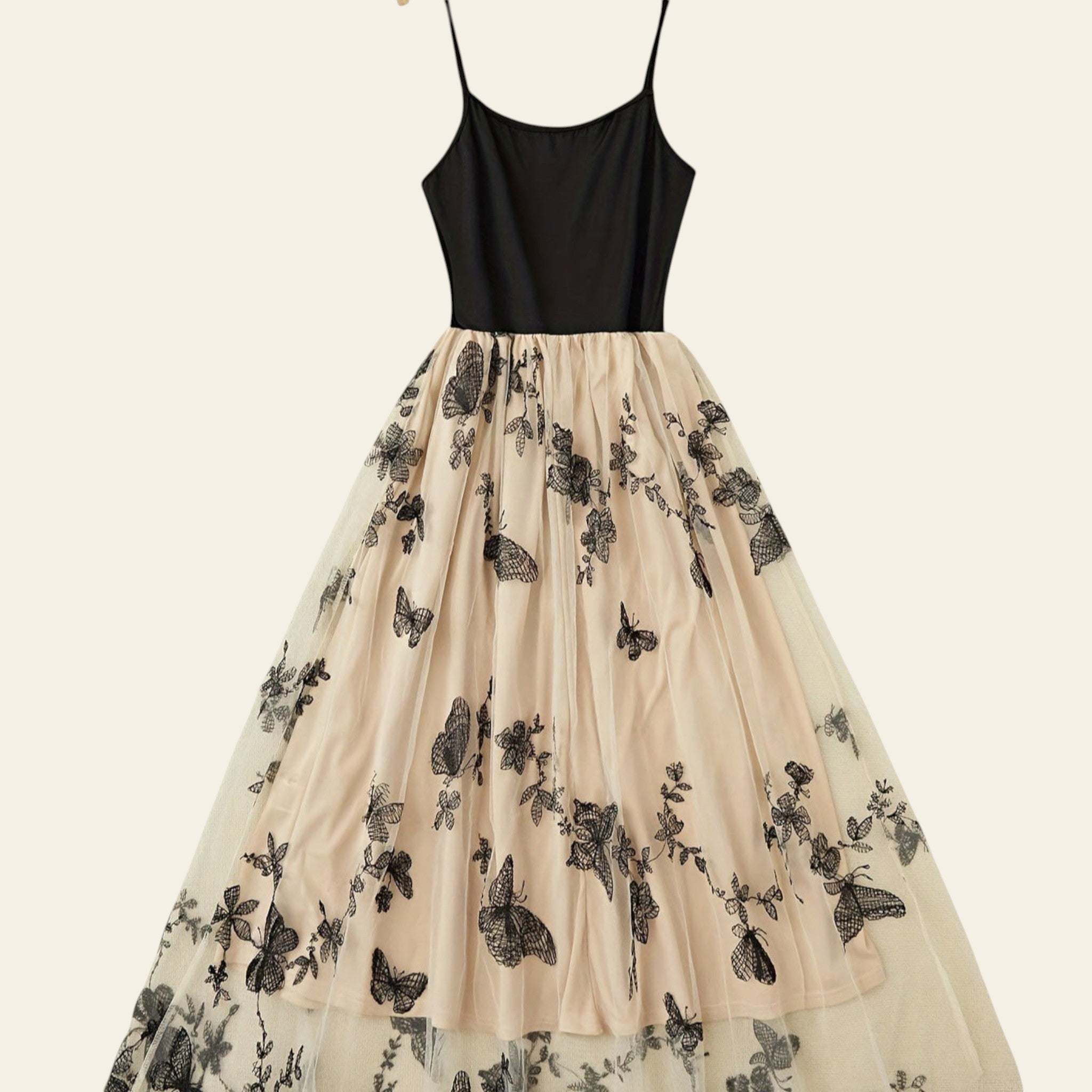 Full view of black butterfly print slip dress