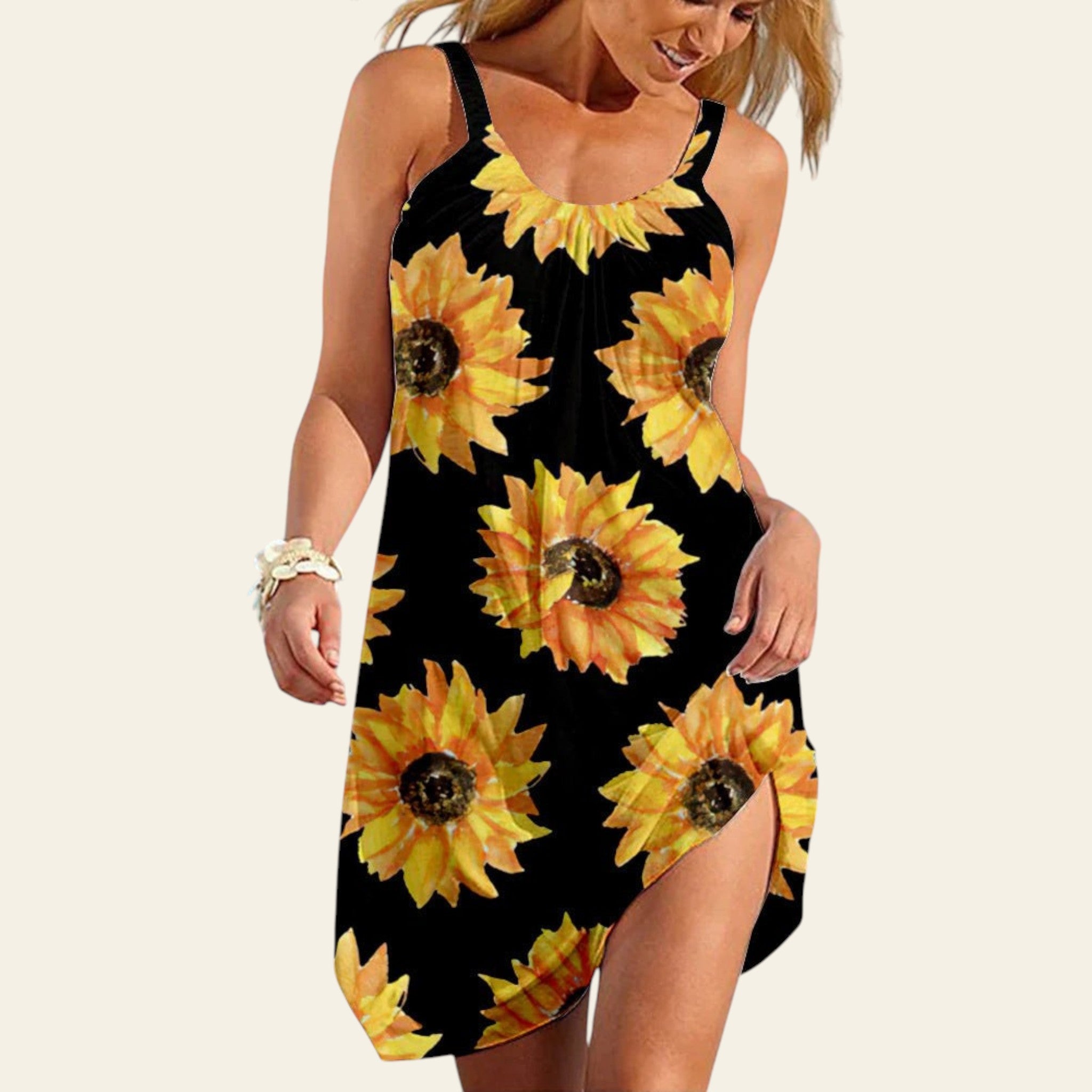 Woman wearing a black sleeveless dress with yellow sunflower print, summer casual style