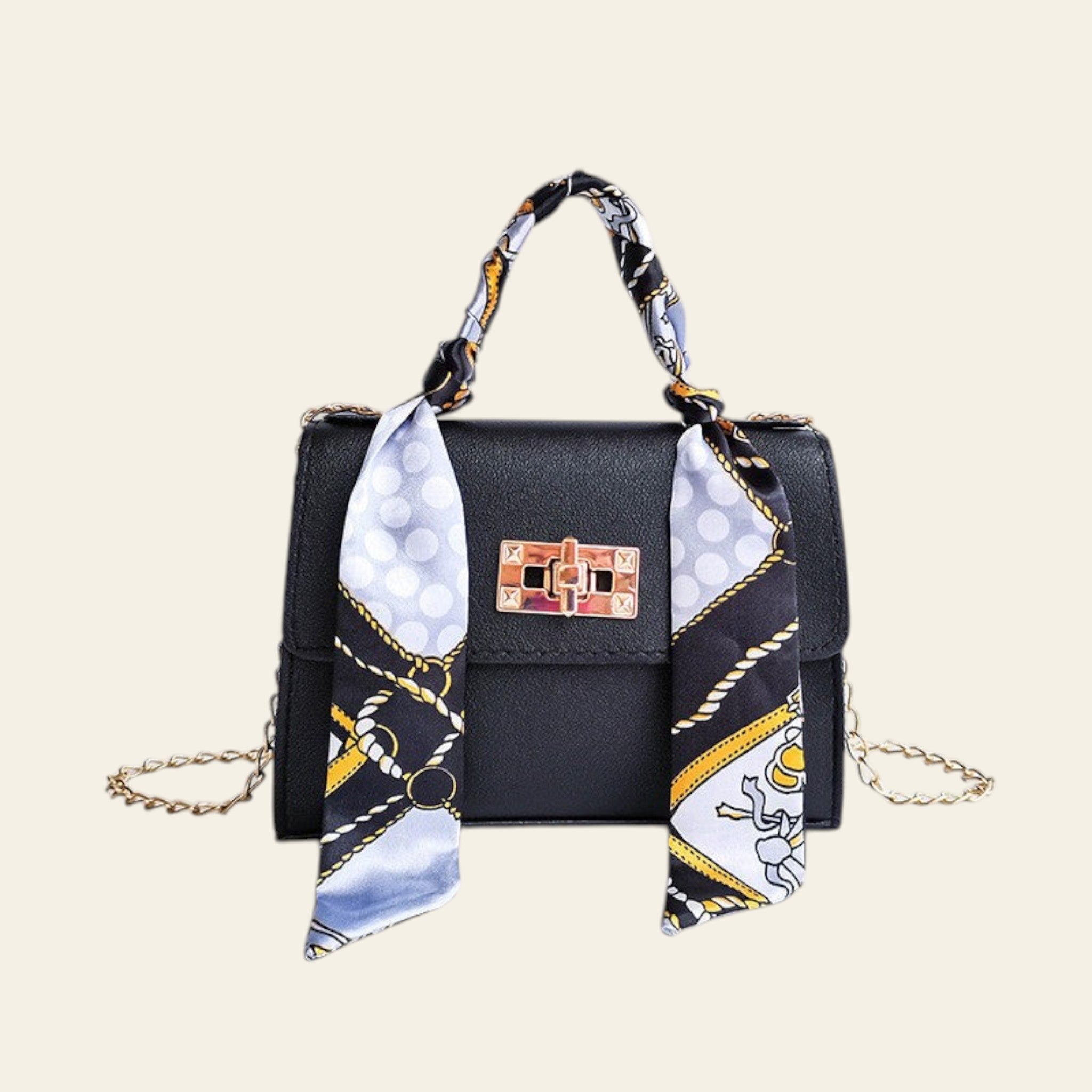 Black handbag with a decorative scarf on a white background