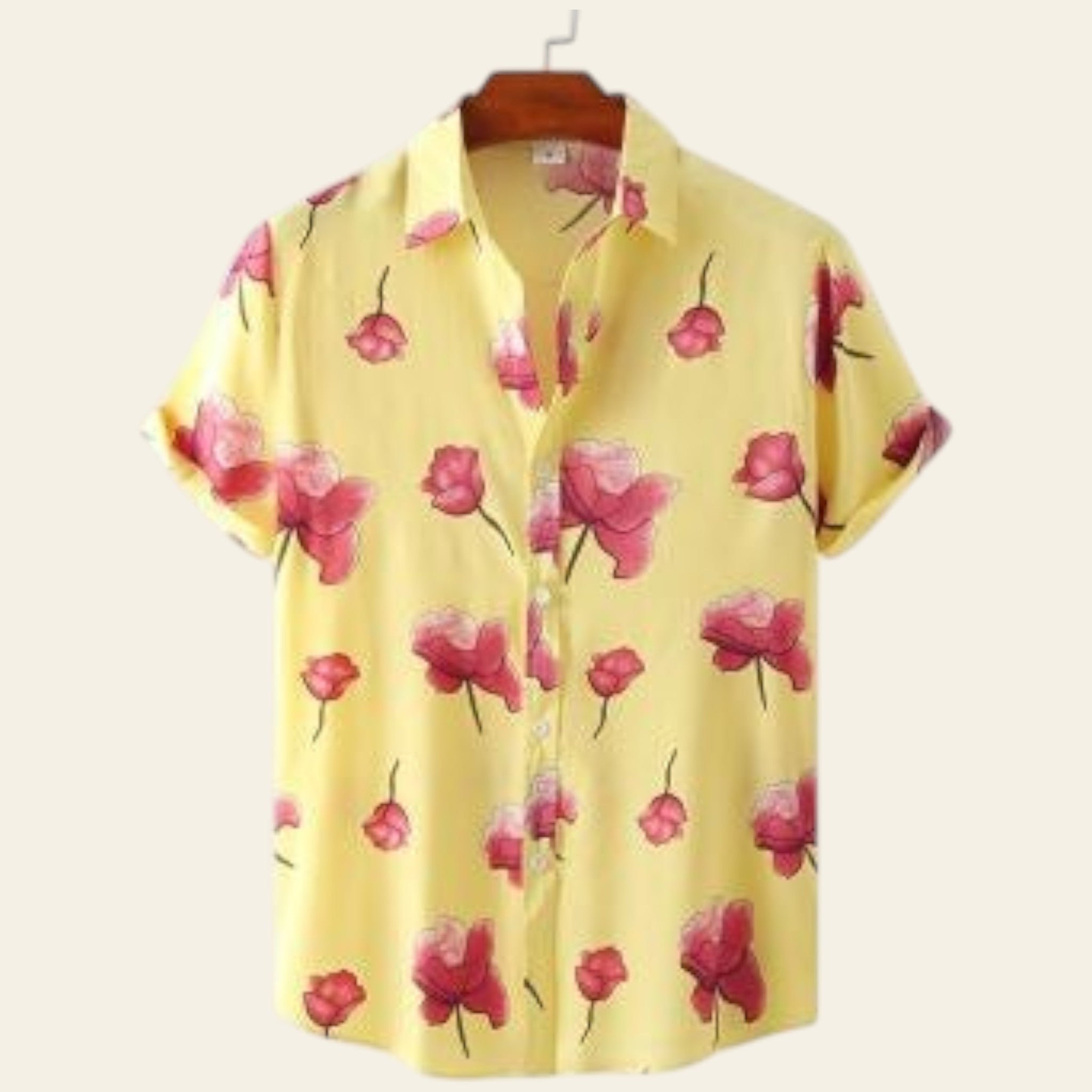 Yellow shirt with pink floral pattern on a white background