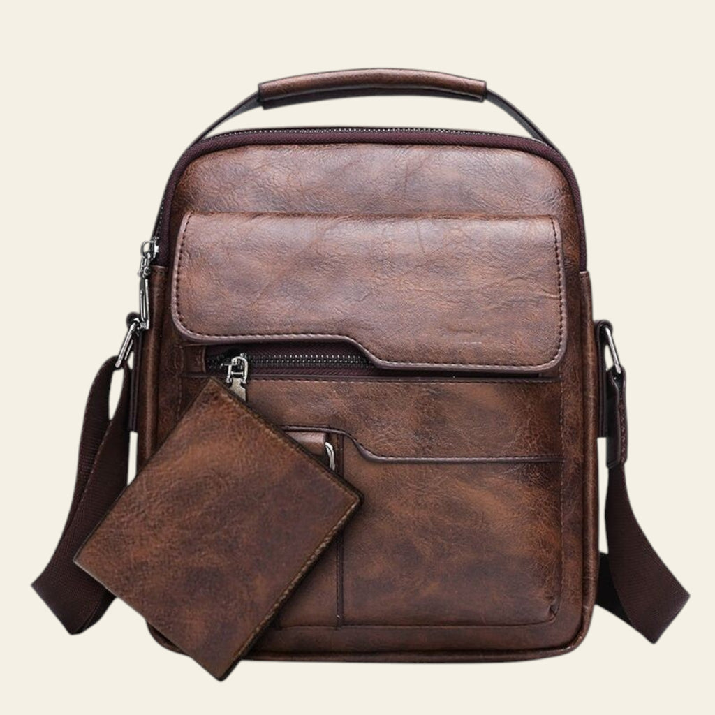 Brown leather backpack with a matching wallet on a white background