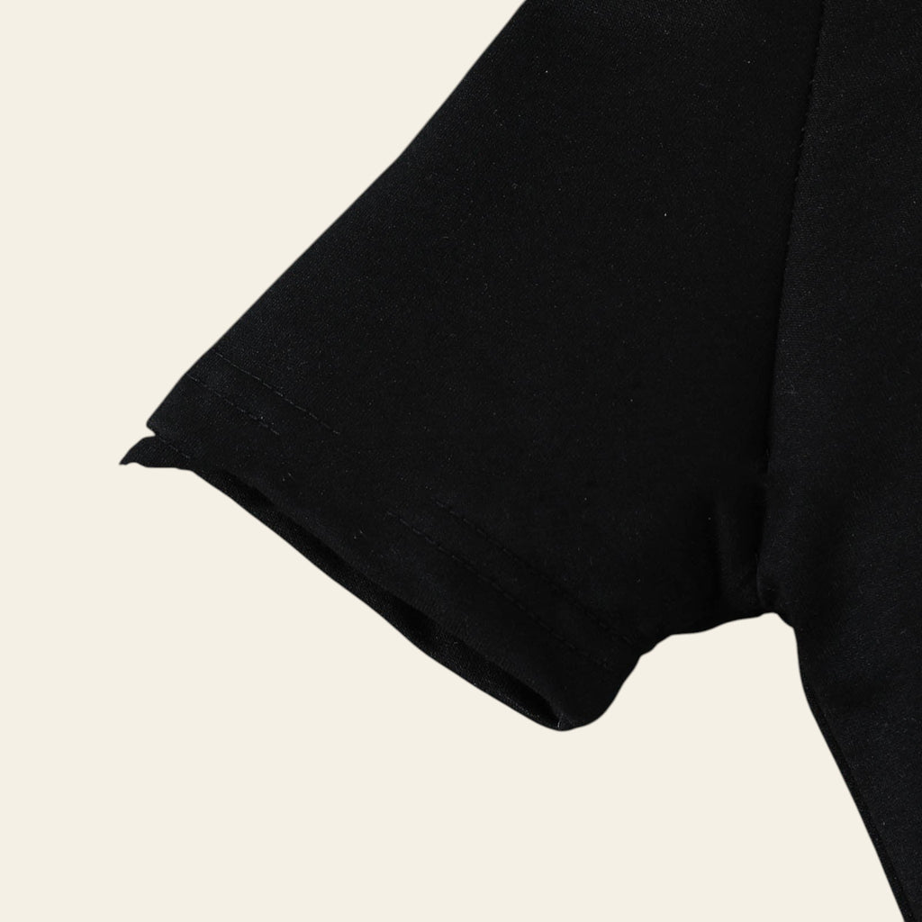 Black fabric on a wooden surface
