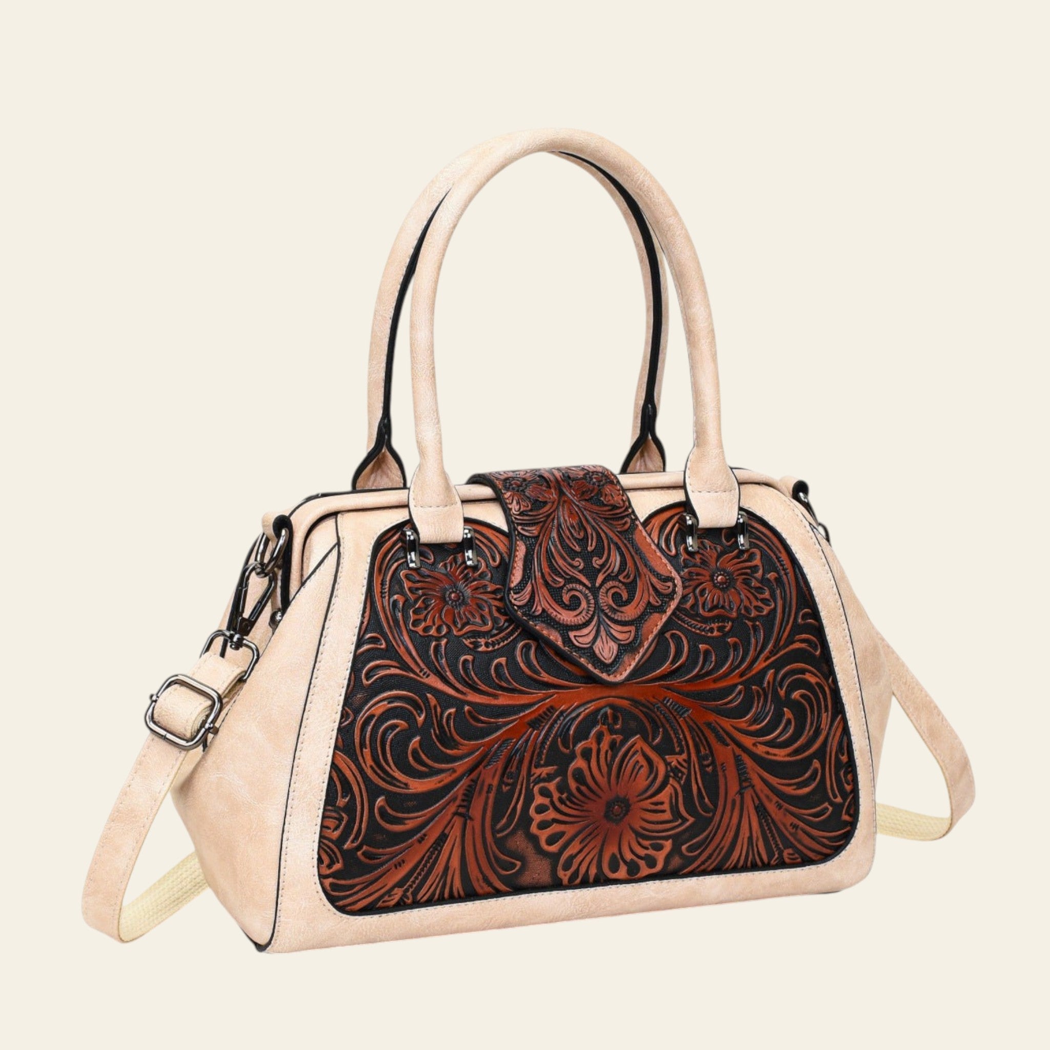 Handbag with floral tooled leather design on a white background