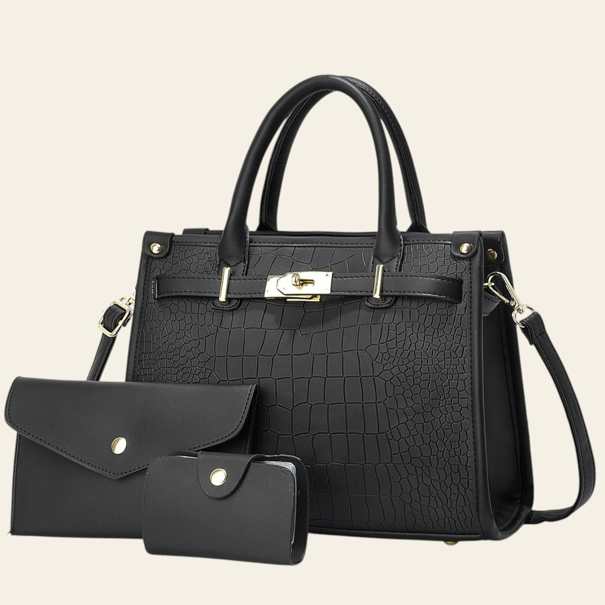 Black crocodile-patterned handbag with matching wallet and cardholder on a light gray background