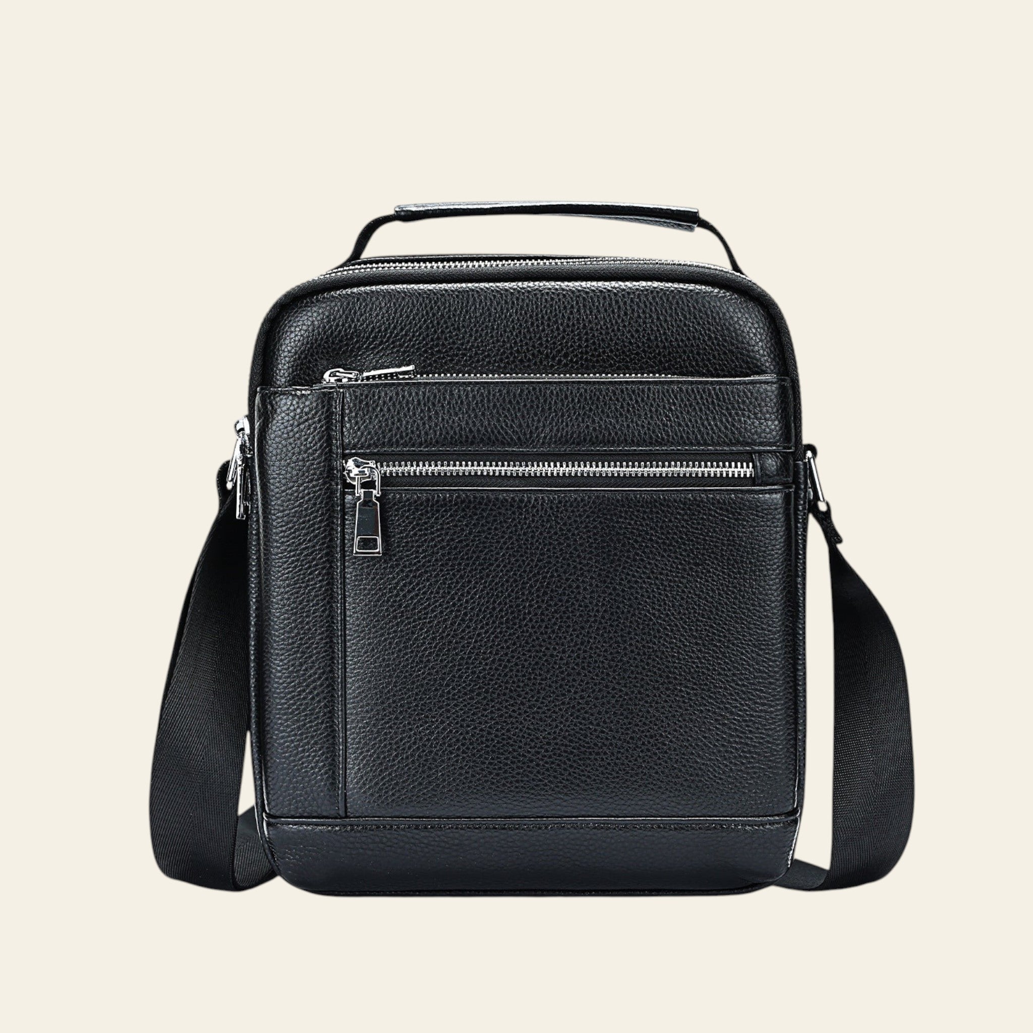 Black leather crossbody bag on a light gray background