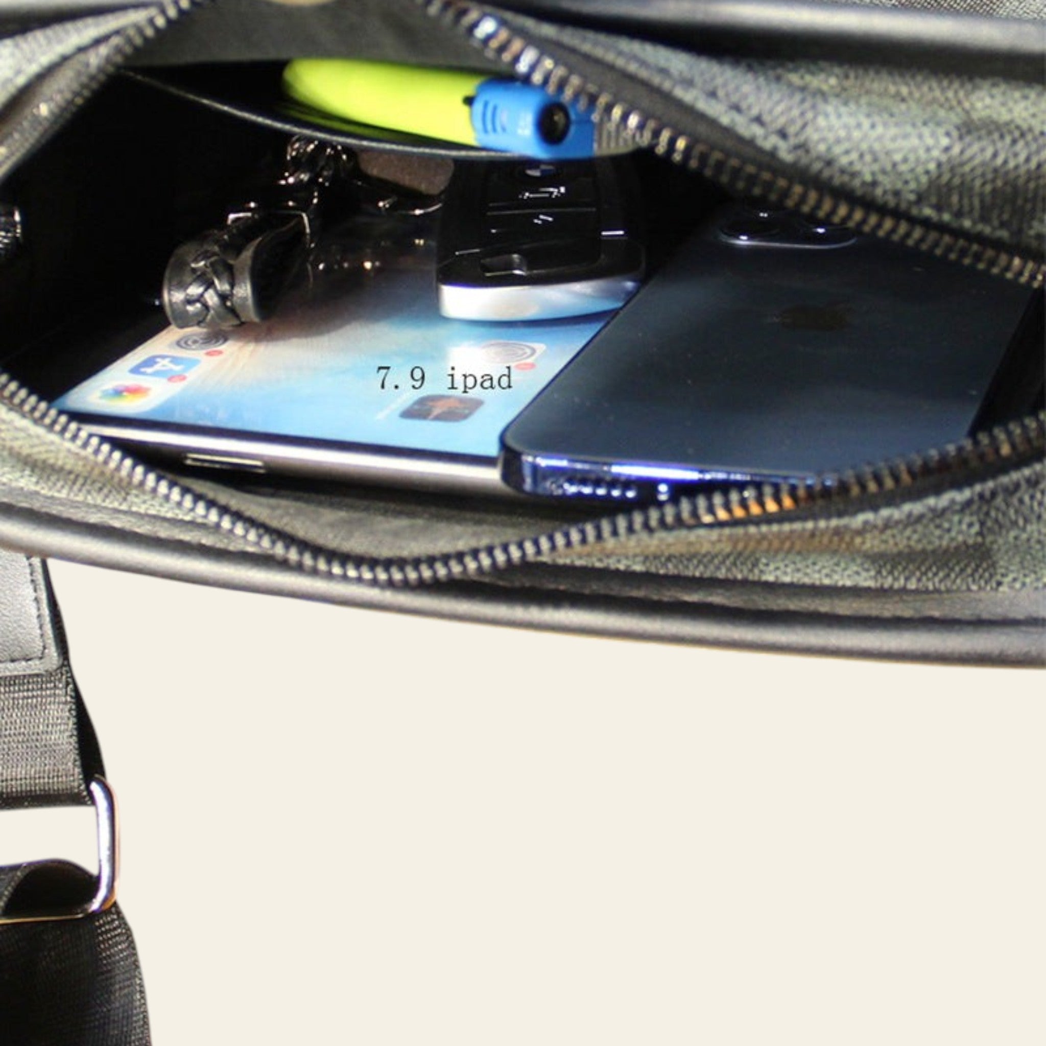 Open bag with electronic devices and items inside