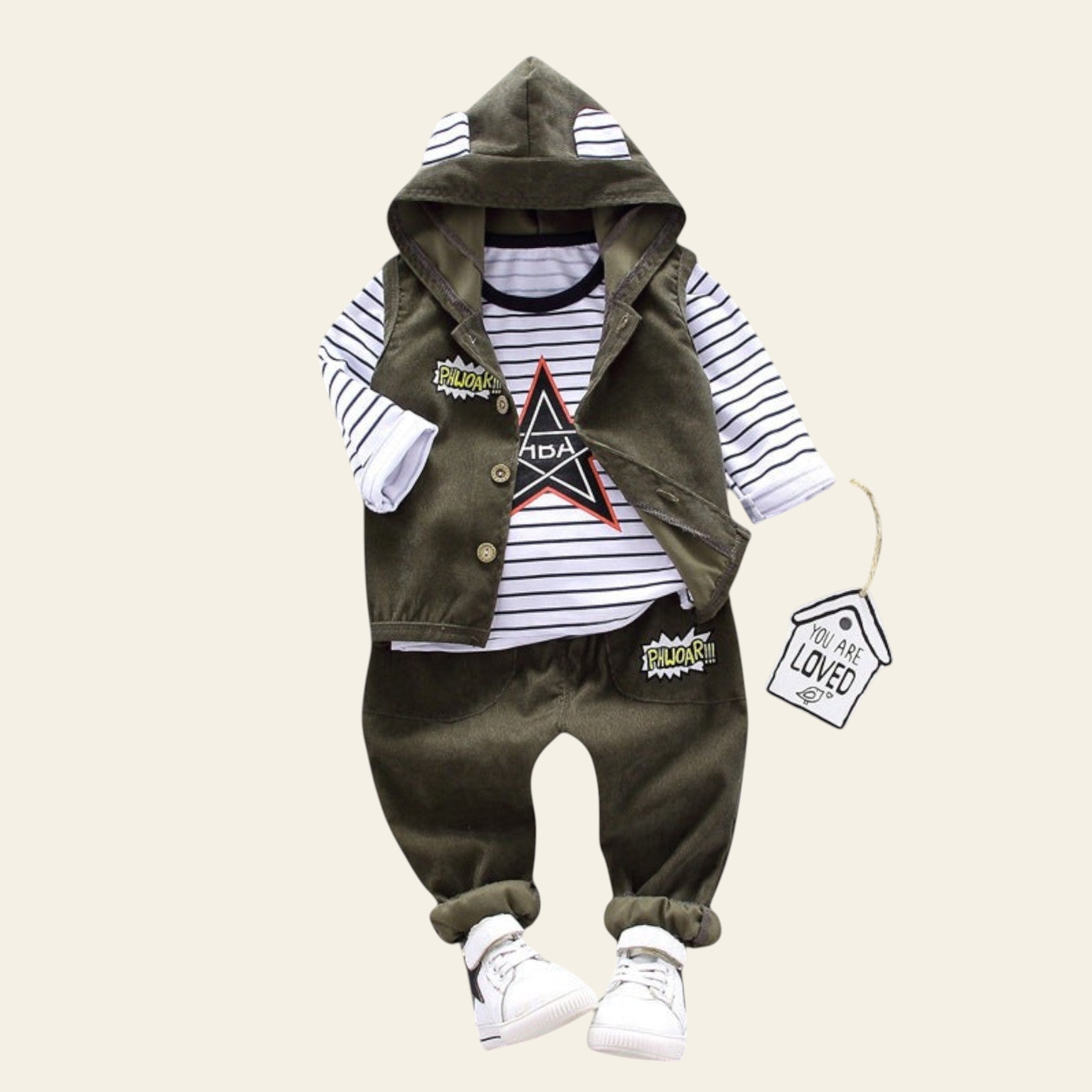 Children's outfit with a hooded jacket, striped shirt, and pants on a gray background.