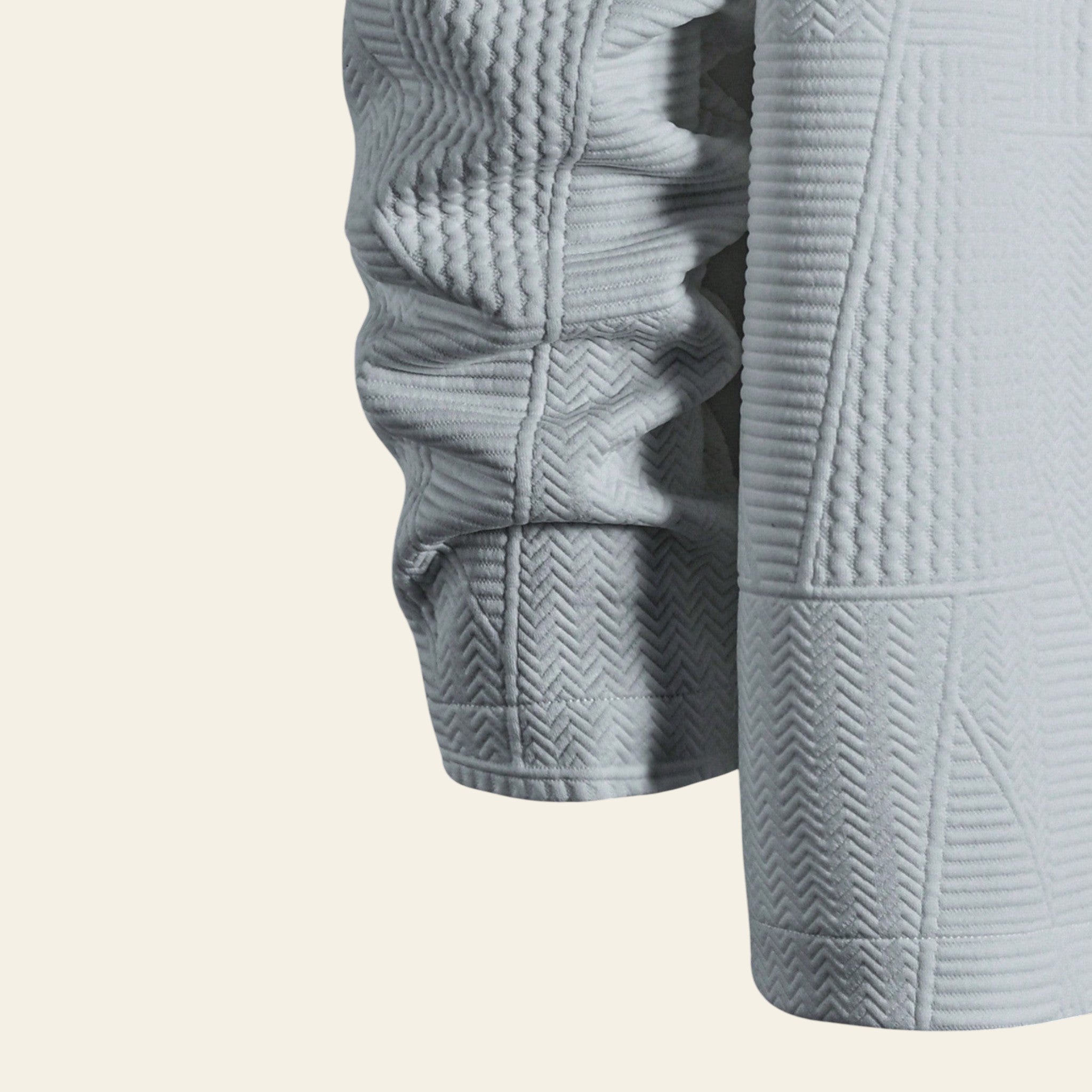 Light gray knit hoodie fabric detail