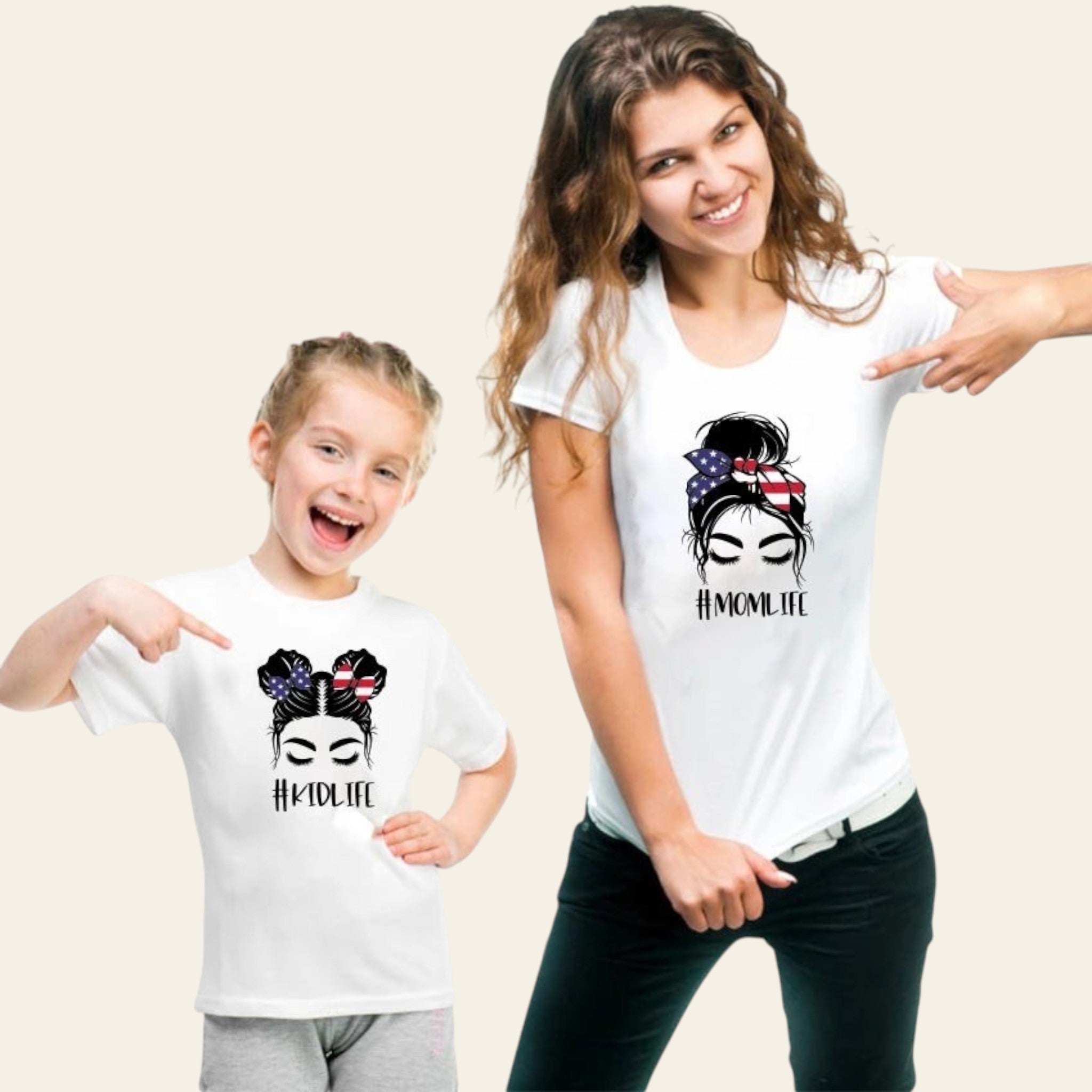 Two people wearing white t-shirts with a graphic design and text.