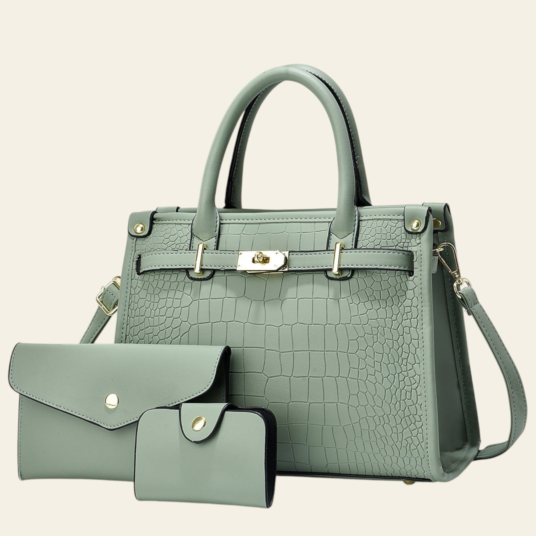 Green handbag with matching wallet on a white background