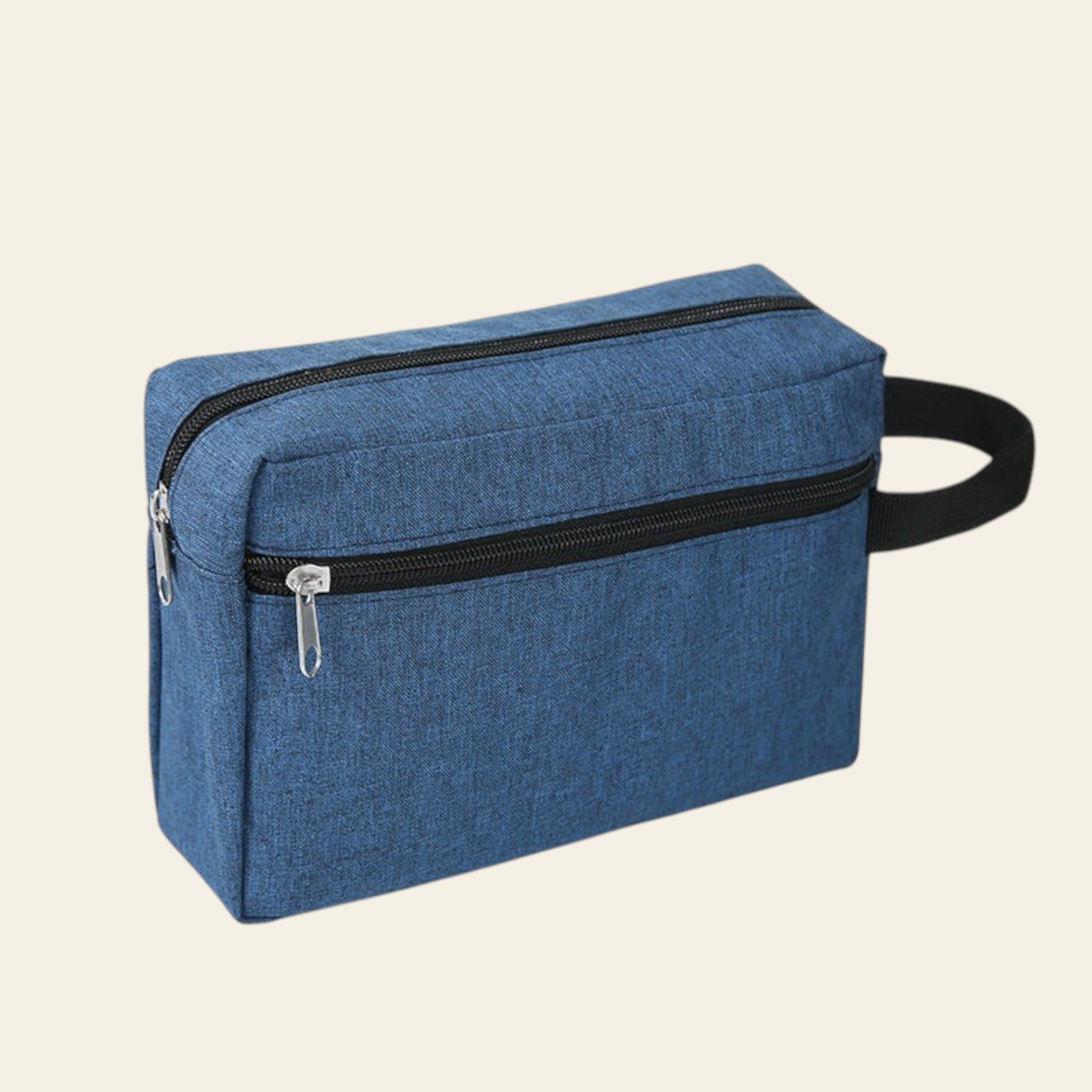 Blue toiletry bag with black zippers on a white background