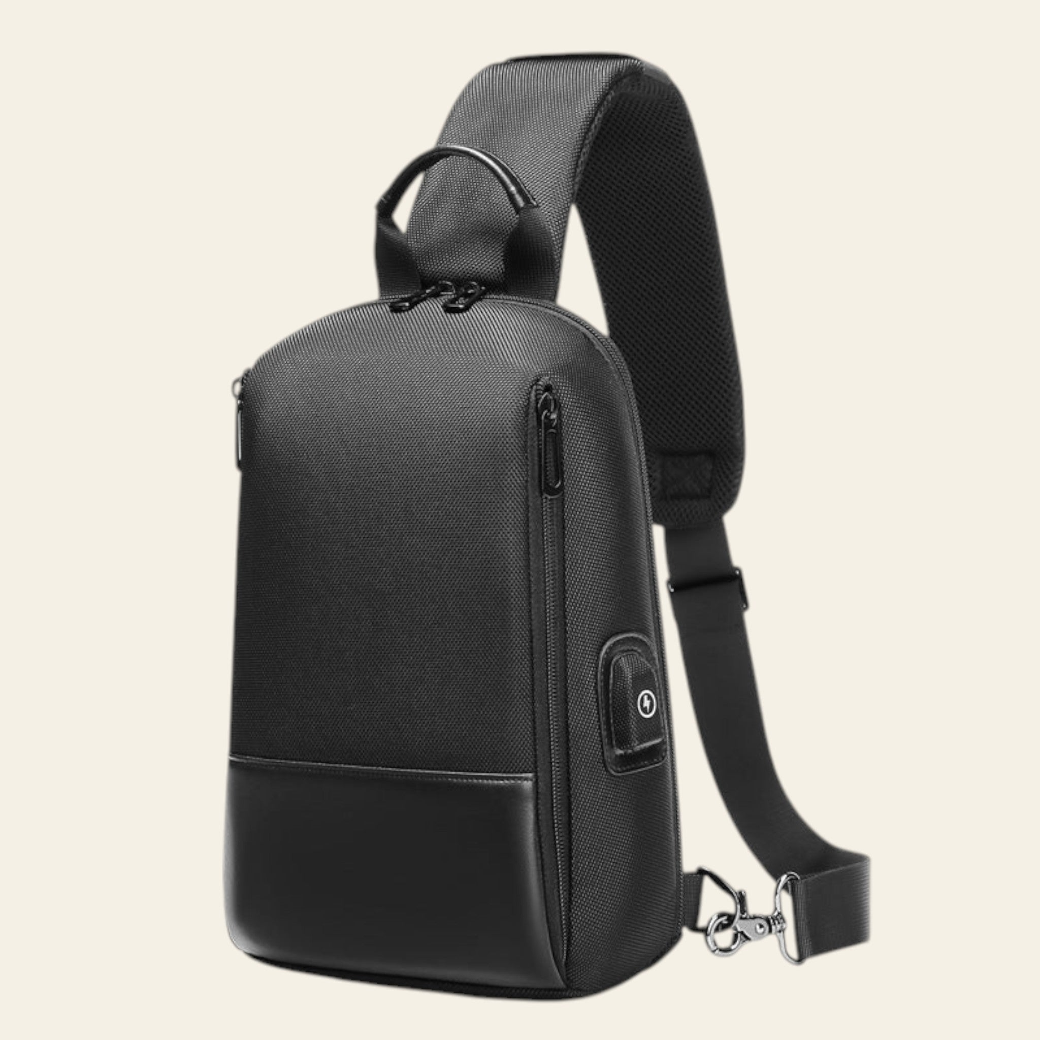 Black sling bag with USB port on a white background