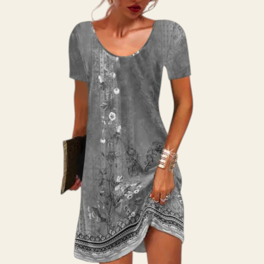 Style Sphere grey floral print short sleeve A-line mini dress with a relaxed fit and breathable polyester material.